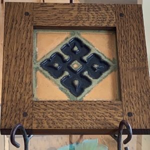 Flint pottery tile framed
